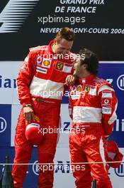 16.07.2006 Magny Cours, France,  Michael Schumacher (GER), Scuderia Ferrari and Felipe Massa (BRA), Scuderia Ferrari - Formula 1 World Championship, Rd 11, French Grand Prix, Sunday Podium