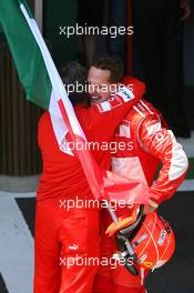 16.07.2006 Magny Cours, France,  Jean Todt (FRA), Scuderia Ferrari, Teamchief, General Manager, Team Principal and Michael Schumacher (GER), Scuderia Ferrari - Formula 1 World Championship, Rd 11, French Grand Prix, Sunday Podium