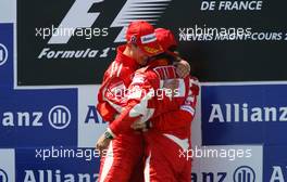 16.07.2006 Magny Cours, France,  Michael Schumacher (GER), Scuderia Ferrari and Felipe Massa (BRA), Scuderia Ferrari - Formula 1 World Championship, Rd 11, French Grand Prix, Sunday Podium