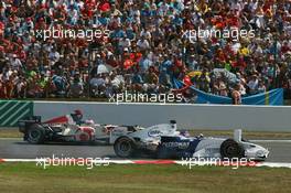 16.07.2006 Magny-Cours, France ** QIS, Quick Image Service ** July, Formula 1 World Championship, Rd 11, French Grand Prix - Every used picture is fee-liable. - EDITORS PLEASE NOTE: QIS, Quick Image Service is a special service for electronic media. QIS images are uploaded directly by the photographer moments after the image has been taken. These images will not be captioned with a text describing what is visible on the picture. Instead they will have a generic caption indicating where and when they were taken. For editors needing a correct caption, the high resolution image (fully captioned) of the same picture will appear some time later on www.xpb.cc. The QIS images will be in low resolution (800 pixels longest side) and reduced to a minimum size (format and file size) for quick transfer. More info about QIS is available at www.xpb.cc - This service is offered by xpb.cc limited - c Copyright: xpb.cc limited  