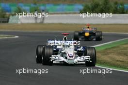 16.07.2006 Magny-Cours, France ** QIS, Quick Image Service ** July, Formula 1 World Championship, Rd 11, French Grand Prix - Every used picture is fee-liable. - EDITORS PLEASE NOTE: QIS, Quick Image Service is a special service for electronic media. QIS images are uploaded directly by the photographer moments after the image has been taken. These images will not be captioned with a text describing what is visible on the picture. Instead they will have a generic caption indicating where and when they were taken. For editors needing a correct caption, the high resolution image (fully captioned) of the same picture will appear some time later on www.xpb.cc. The QIS images will be in low resolution (800 pixels longest side) and reduced to a minimum size (format and file size) for quick transfer. More info about QIS is available at www.xpb.cc - This service is offered by xpb.cc limited - c Copyright: xpb.cc limited  