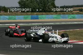 16.07.2006 Magny-Cours, France ** QIS, Quick Image Service ** July, Formula 1 World Championship, Rd 11, French Grand Prix - Every used picture is fee-liable. - EDITORS PLEASE NOTE: QIS, Quick Image Service is a special service for electronic media. QIS images are uploaded directly by the photographer moments after the image has been taken. These images will not be captioned with a text describing what is visible on the picture. Instead they will have a generic caption indicating where and when they were taken. For editors needing a correct caption, the high resolution image (fully captioned) of the same picture will appear some time later on www.xpb.cc. The QIS images will be in low resolution (800 pixels longest side) and reduced to a minimum size (format and file size) for quick transfer. More info about QIS is available at www.xpb.cc - This service is offered by xpb.cc limited - c Copyright: xpb.cc limited  