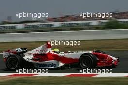 16.07.2006 Magny-Cours, France ** QIS, Quick Image Service ** July, Formula 1 World Championship, Rd 11, French Grand Prix - Every used picture is fee-liable. - EDITORS PLEASE NOTE: QIS, Quick Image Service is a special service for electronic media. QIS images are uploaded directly by the photographer moments after the image has been taken. These images will not be captioned with a text describing what is visible on the picture. Instead they will have a generic caption indicating where and when they were taken. For editors needing a correct caption, the high resolution image (fully captioned) of the same picture will appear some time later on www.xpb.cc. The QIS images will be in low resolution (800 pixels longest side) and reduced to a minimum size (format and file size) for quick transfer. More info about QIS is available at www.xpb.cc - This service is offered by xpb.cc limited - c Copyright: xpb.cc limited  