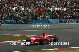 15.07.2006 Magny-Cours, France ** QIS, Quick Image Service ** July, Formula 1 World Championship, Rd 11, French Grand Prix - Every used picture is fee-liable. - EDITORS PLEASE NOTE: QIS, Quick Image Service is a special service for electronic media. QIS images are uploaded directly by the photographer moments after the image has been taken. These images will not be captioned with a text describing what is visible on the picture. Instead they will have a generic caption indicating where and when they were taken. For editors needing a correct caption, the high resolution image (fully captioned) of the same picture will appear some time later on www.xpb.cc. The QIS images will be in low resolution (800 pixels longest side) and reduced to a minimum size (format and file size) for quick transfer. More info about QIS is available at www.xpb.cc - This service is offered by xpb.cc limited - c Copyright: xpb.cc limited  