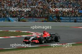 15.07.2006 Magny-Cours, France ** QIS, Quick Image Service ** July, Formula 1 World Championship, Rd 11, French Grand Prix - Every used picture is fee-liable. - EDITORS PLEASE NOTE: QIS, Quick Image Service is a special service for electronic media. QIS images are uploaded directly by the photographer moments after the image has been taken. These images will not be captioned with a text describing what is visible on the picture. Instead they will have a generic caption indicating where and when they were taken. For editors needing a correct caption, the high resolution image (fully captioned) of the same picture will appear some time later on www.xpb.cc. The QIS images will be in low resolution (800 pixels longest side) and reduced to a minimum size (format and file size) for quick transfer. More info about QIS is available at www.xpb.cc - This service is offered by xpb.cc limited - c Copyright: xpb.cc limited  