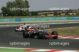 16.07.2006 Magny-Cours, France ** QIS, Quick Image Service ** July, Formula 1 World Championship, Rd 11, French Grand Prix - Every used picture is fee-liable. - EDITORS PLEASE NOTE: QIS, Quick Image Service is a special service for electronic media. QIS images are uploaded directly by the photographer moments after the image has been taken. These images will not be captioned with a text describing what is visible on the picture. Instead they will have a generic caption indicating where and when they were taken. For editors needing a correct caption, the high resolution image (fully captioned) of the same picture will appear some time later on www.xpb.cc. The QIS images will be in low resolution (800 pixels longest side) and reduced to a minimum size (format and file size) for quick transfer. More info about QIS is available at www.xpb.cc - This service is offered by xpb.cc limited - c Copyright: xpb.cc limited  