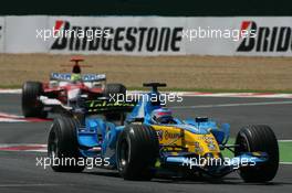 16.07.2006 Magny-Cours, France ** QIS, Quick Image Service ** July, Formula 1 World Championship, Rd 11, French Grand Prix - Every used picture is fee-liable. - EDITORS PLEASE NOTE: QIS, Quick Image Service is a special service for electronic media. QIS images are uploaded directly by the photographer moments after the image has been taken. These images will not be captioned with a text describing what is visible on the picture. Instead they will have a generic caption indicating where and when they were taken. For editors needing a correct caption, the high resolution image (fully captioned) of the same picture will appear some time later on www.xpb.cc. The QIS images will be in low resolution (800 pixels longest side) and reduced to a minimum size (format and file size) for quick transfer. More info about QIS is available at www.xpb.cc - This service is offered by xpb.cc limited - c Copyright: xpb.cc limited  