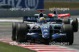 16.07.2006 Magny-Cours, France ** QIS, Quick Image Service ** July, Formula 1 World Championship, Rd 11, French Grand Prix - Every used picture is fee-liable. - EDITORS PLEASE NOTE: QIS, Quick Image Service is a special service for electronic media. QIS images are uploaded directly by the photographer moments after the image has been taken. These images will not be captioned with a text describing what is visible on the picture. Instead they will have a generic caption indicating where and when they were taken. For editors needing a correct caption, the high resolution image (fully captioned) of the same picture will appear some time later on www.xpb.cc. The QIS images will be in low resolution (800 pixels longest side) and reduced to a minimum size (format and file size) for quick transfer. More info about QIS is available at www.xpb.cc - This service is offered by xpb.cc limited - c Copyright: xpb.cc limited  