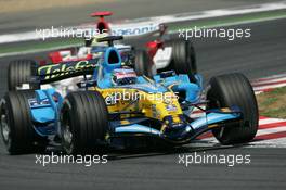 16.07.2006 Magny-Cours, France ** QIS, Quick Image Service ** July, Formula 1 World Championship, Rd 11, French Grand Prix - Every used picture is fee-liable. - EDITORS PLEASE NOTE: QIS, Quick Image Service is a special service for electronic media. QIS images are uploaded directly by the photographer moments after the image has been taken. These images will not be captioned with a text describing what is visible on the picture. Instead they will have a generic caption indicating where and when they were taken. For editors needing a correct caption, the high resolution image (fully captioned) of the same picture will appear some time later on www.xpb.cc. The QIS images will be in low resolution (800 pixels longest side) and reduced to a minimum size (format and file size) for quick transfer. More info about QIS is available at www.xpb.cc - This service is offered by xpb.cc limited - c Copyright: xpb.cc limited  