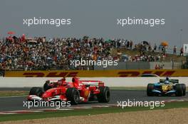 15.07.2006 Magny-Cours, France ** QIS, Quick Image Service ** July, Formula 1 World Championship, Rd 11, French Grand Prix - Every used picture is fee-liable. - EDITORS PLEASE NOTE: QIS, Quick Image Service is a special service for electronic media. QIS images are uploaded directly by the photographer moments after the image has been taken. These images will not be captioned with a text describing what is visible on the picture. Instead they will have a generic caption indicating where and when they were taken. For editors needing a correct caption, the high resolution image (fully captioned) of the same picture will appear some time later on www.xpb.cc. The QIS images will be in low resolution (800 pixels longest side) and reduced to a minimum size (format and file size) for quick transfer. More info about QIS is available at www.xpb.cc - This service is offered by xpb.cc limited - c Copyright: xpb.cc limited  