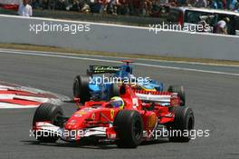 16.07.2006 Magny-Cours, France ** QIS, Quick Image Service ** July, Formula 1 World Championship, Rd 11, French Grand Prix - Every used picture is fee-liable. - EDITORS PLEASE NOTE: QIS, Quick Image Service is a special service for electronic media. QIS images are uploaded directly by the photographer moments after the image has been taken. These images will not be captioned with a text describing what is visible on the picture. Instead they will have a generic caption indicating where and when they were taken. For editors needing a correct caption, the high resolution image (fully captioned) of the same picture will appear some time later on www.xpb.cc. The QIS images will be in low resolution (800 pixels longest side) and reduced to a minimum size (format and file size) for quick transfer. More info about QIS is available at www.xpb.cc - This service is offered by xpb.cc limited - c Copyright: xpb.cc limited  