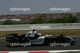 16.07.2006 Magny-Cours, France ** QIS, Quick Image Service ** July, Formula 1 World Championship, Rd 11, French Grand Prix - Every used picture is fee-liable. - EDITORS PLEASE NOTE: QIS, Quick Image Service is a special service for electronic media. QIS images are uploaded directly by the photographer moments after the image has been taken. These images will not be captioned with a text describing what is visible on the picture. Instead they will have a generic caption indicating where and when they were taken. For editors needing a correct caption, the high resolution image (fully captioned) of the same picture will appear some time later on www.xpb.cc. The QIS images will be in low resolution (800 pixels longest side) and reduced to a minimum size (format and file size) for quick transfer. More info about QIS is available at www.xpb.cc - This service is offered by xpb.cc limited - c Copyright: xpb.cc limited  