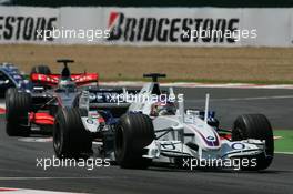 16.07.2006 Magny-Cours, France ** QIS, Quick Image Service ** July, Formula 1 World Championship, Rd 11, French Grand Prix - Every used picture is fee-liable. - EDITORS PLEASE NOTE: QIS, Quick Image Service is a special service for electronic media. QIS images are uploaded directly by the photographer moments after the image has been taken. These images will not be captioned with a text describing what is visible on the picture. Instead they will have a generic caption indicating where and when they were taken. For editors needing a correct caption, the high resolution image (fully captioned) of the same picture will appear some time later on www.xpb.cc. The QIS images will be in low resolution (800 pixels longest side) and reduced to a minimum size (format and file size) for quick transfer. More info about QIS is available at www.xpb.cc - This service is offered by xpb.cc limited - c Copyright: xpb.cc limited  