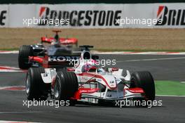 16.07.2006 Magny-Cours, France ** QIS, Quick Image Service ** July, Formula 1 World Championship, Rd 11, French Grand Prix - Every used picture is fee-liable. - EDITORS PLEASE NOTE: QIS, Quick Image Service is a special service for electronic media. QIS images are uploaded directly by the photographer moments after the image has been taken. These images will not be captioned with a text describing what is visible on the picture. Instead they will have a generic caption indicating where and when they were taken. For editors needing a correct caption, the high resolution image (fully captioned) of the same picture will appear some time later on www.xpb.cc. The QIS images will be in low resolution (800 pixels longest side) and reduced to a minimum size (format and file size) for quick transfer. More info about QIS is available at www.xpb.cc - This service is offered by xpb.cc limited - c Copyright: xpb.cc limited  