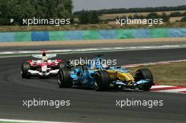 16.07.2006 Magny-Cours, France ** QIS, Quick Image Service ** July, Formula 1 World Championship, Rd 11, French Grand Prix - Every used picture is fee-liable. - EDITORS PLEASE NOTE: QIS, Quick Image Service is a special service for electronic media. QIS images are uploaded directly by the photographer moments after the image has been taken. These images will not be captioned with a text describing what is visible on the picture. Instead they will have a generic caption indicating where and when they were taken. For editors needing a correct caption, the high resolution image (fully captioned) of the same picture will appear some time later on www.xpb.cc. The QIS images will be in low resolution (800 pixels longest side) and reduced to a minimum size (format and file size) for quick transfer. More info about QIS is available at www.xpb.cc - This service is offered by xpb.cc limited - c Copyright: xpb.cc limited  