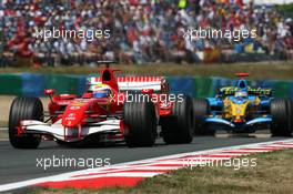 16.07.2006 Magny Cours, France,  Felipe Massa (BRA), Scuderia Ferrari 248 F1, leads Fernando Alonso (ESP), Renault F1 Team R26 - Formula 1 World Championship, Rd 11, French Grand Prix, Sunday Race