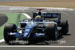 16.07.2006 Magny Cours, France,  Mark Webber (AUS), WilliamsF1 Team FW28, coming into the pits with a flat tyre after a spin - Formula 1 World Championship, Rd 11, French Grand Prix, Sunday Race