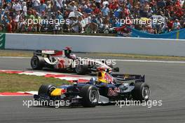 16.07.2006 Magny Cours, France,  David Coulthard (GBR), Red Bull Racing, RB2 and Rubens Barrichello (BRA), Honda Racing F1 Team, RA106 - Formula 1 World Championship, Rd 11, French Grand Prix, Sunday Race