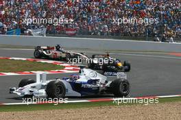 16.07.2006 Magny Cours, France,  Jacques Villeneuve (CDN), BMW Sauber F1 Team, F1.06 and Christian Klien (AUT), Red Bull Racing, RB2 - Formula 1 World Championship, Rd 11, French Grand Prix, Sunday Race