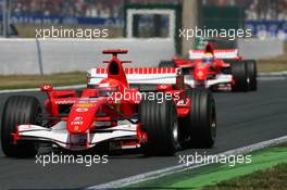 16.07.2006 Magny Cours, France,  Michael Schumacher (GER), Scuderia Ferrari 248 F1, leads Felipe Massa (BRA), Scuderia Ferrari 248 F1 - Formula 1 World Championship, Rd 11, French Grand Prix, Sunday Race