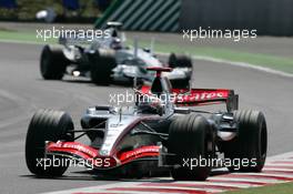 16.07.2006 Magny Cours, France,  Kimi Raikkonen (FIN), Team West McLaren Mercedes MP4-21 - Formula 1 World Championship, Rd 11, French Grand Prix, Sunday Race