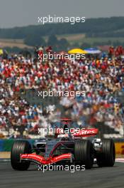 16.07.2006 Magny Cours, France,  Kimi Raikkonen (FIN), Team West McLaren Mercedes MP4-21 - Formula 1 World Championship, Rd 11, French Grand Prix, Sunday Race