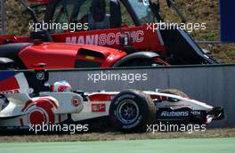 16.07.2006 Magny Cours, France,  Rubens Barrichello (BRA), Honda Racing F1 Team RA106, retiring from the race - Formula 1 World Championship, Rd 11, French Grand Prix, Sunday Race