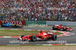 16.07.2006 Magny Cours, France,  Michael Schumacher (GER), Scuderia Ferrari, 248 F1, Felipe Massa (BRA), Scuderia Ferrari, 248 F1 and Fernando Alonso (ESP), Renault F1 Team, R26 - Formula 1 World Championship, Rd 11, French Grand Prix, Sunday Race