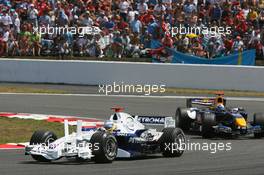 16.07.2006 Magny Cours, France,  Nick Heidfeld (GER), BMW Sauber F1 Team, F1.06 and David Coulthard (GBR), Red Bull Racing, RB2 - Formula 1 World Championship, Rd 11, French Grand Prix, Sunday Race