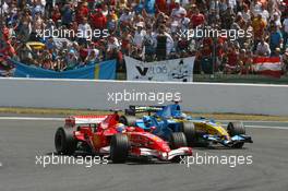 16.07.2006 Magny Cours, France,  Felipe Massa (BRA), Scuderia Ferrari, 248 F1, Fernando Alonso (ESP), Renault F1 Team, R26 - Formula 1 World Championship, Rd 11, French Grand Prix, Sunday Race