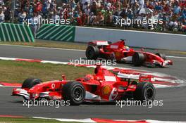 16.07.2006 Magny Cours, France,  Michael Schumacher (GER), Scuderia Ferrari, 248 F1 and Felipe Massa (BRA), Scuderia Ferrari, 248 F1 - Formula 1 World Championship, Rd 11, French Grand Prix, Sunday Race