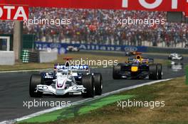 16.07.2006 Magny Cours, France,  Nick Heidfeld (GER), BMW Sauber F1 Team F1.06, leads David Coulthard (GBR), Red Bull Racing RB2- Formula 1 World Championship, Rd 11, French Grand Prix, Sunday Race