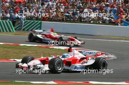 16.07.2006 Magny Cours, France,  Jarno Trulli (ITA), Toyota Racing, TF106 and Ralf Schumacher (GER), Toyota Racing, TF106 - Formula 1 World Championship, Rd 11, French Grand Prix, Sunday Race