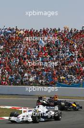 16.07.2006 Magny Cours, France,  Nick Heidfeld (GER), BMW Sauber F1 Team, F1.06 and David Coulthard (GBR), Red Bull Racing, RB2 - Formula 1 World Championship, Rd 11, French Grand Prix, Sunday Race