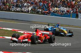 16.07.2006 Magny Cours, France,  Felipe Massa (BRA), Scuderia Ferrari, 248 F1 and Fernando Alonso (ESP), Renault F1 Team, R26 - Formula 1 World Championship, Rd 11, French Grand Prix, Sunday Race