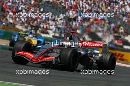 16.07.2006 Magny Cours, France,  Kimi Raikkonen (FIN), Team West McLaren Mercedes MP4-21 - Formula 1 World Championship, Rd 11, French Grand Prix, Sunday Race