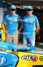 15.07.2006 Magny Cours, France,  Fernando Alonso (ESP), Renault F1 Team, Portrait (left) and Giancarlo Fisichella (ITA), Renault F1 Team, Portrait (right) - Formula 1 World Championship, Rd 11, French Grand Prix, Saturday