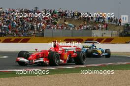 15.07.2006 Magny Cours, France,  Michael Schumacher (GER), Scuderia Ferrari, 248 F1 and Fernando Alonso (ESP), Renault F1 Team, R26 - Formula 1 World Championship, Rd 11, French Grand Prix, Saturday Qualifying