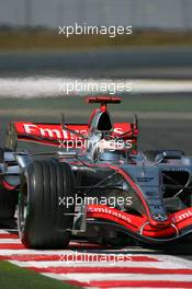 15.07.2006 Magny Cours, France,  Kimi Raikkonen (FIN), Räikkönen, McLaren Mercedes, MP4-21 - Formula 1 World Championship, Rd 11, French Grand Prix, Saturday Practice