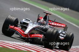 15.07.2006 Magny Cours, France,  Kimi Raikkonen (FIN), Räikkönen, McLaren Mercedes, MP4-21 - Formula 1 World Championship, Rd 11, French Grand Prix, Saturday Qualifying