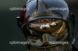 15.07.2006 Magny Cours, France,  Nick Heidfeld (GER), BMW Sauber F1 Team, F1.06, Reflection in a Fire Marshalls helmet - Formula 1 World Championship, Rd 11, French Grand Prix, Saturday Practice