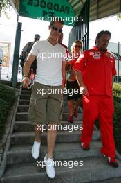 15.07.2006 Magny Cours, France,  Michael Schumacher (GER), Scuderia Ferrari, Portrait, entering the paddock - Formula 1 World Championship, Rd 11, French Grand Prix, Saturday