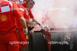 15.07.2006 Magny Cours, France,  Car of Michael Schumacher (GER), Scuderia Ferrari 248 F1, caught fire when returning in the pits - Formula 1 World Championship, Rd 11, French Grand Prix, Saturday Practice