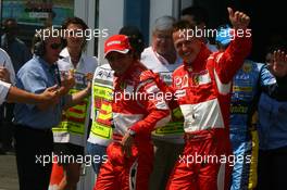 15.07.2006 Magny Cours, France,  Michael Schumacher (GER), Scuderia Ferrari gets pole position and Felipe Massa (BRA), Scuderia Ferrari gets 2nd place - Formula 1 World Championship, Rd 11, French Grand Prix, Saturday Qualifying