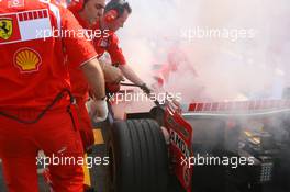 15.07.2006 Magny Cours, France,  Car of Michael Schumacher (GER), Scuderia Ferrari 248 F1, caught fire when returning in the pits - Formula 1 World Championship, Rd 11, French Grand Prix, Saturday Practice