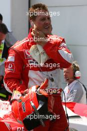 15.07.2006 Magny Cours, France,  Michael Schumacher (GER), Scuderia Ferrari gets pole position - Formula 1 World Championship, Rd 11, French Grand Prix, Saturday Qualifying