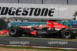 15.07.2006 Magny Cours, France,  Tiago Monteiro (POR), Midland F1 Racing M16. off track - Formula 1 World Championship, Rd 11, French Grand Prix, Saturday Qualifying