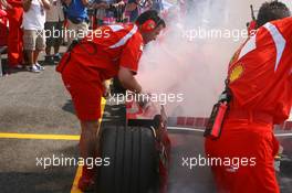 15.07.2006 Magny Cours, France,  Car of Michael Schumacher (GER), Scuderia Ferrari 248 F1, caught fire when returning in the pits - Formula 1 World Championship, Rd 11, French Grand Prix, Saturday Practice