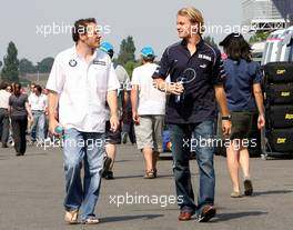 15.07.2006 Magny Cours, France,  Jacques Villeneuve (CDN), BMW Sauber F1 Team with Nico Rosberg (GER), WilliamsF1 Team - Formula 1 World Championship, Rd 11, French Grand Prix, Saturday