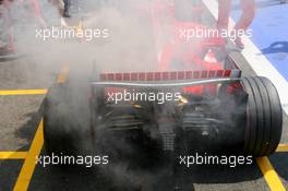 15.07.2006 Magny Cours, France,  Car of Michael Schumacher (GER), Scuderia Ferrari 248 F1, caught fire when returning in the pits - Formula 1 World Championship, Rd 11, French Grand Prix, Saturday Practice